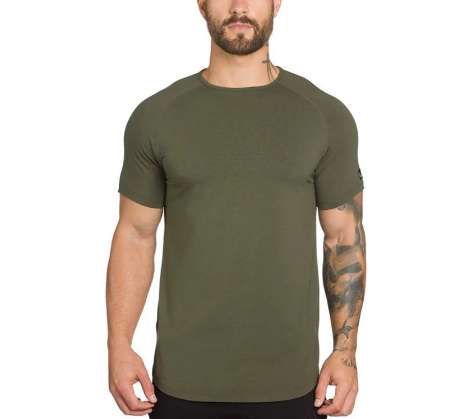 Plain men's fitness shirt in army green, made from cotton and spandex blend, shown on a hanger.