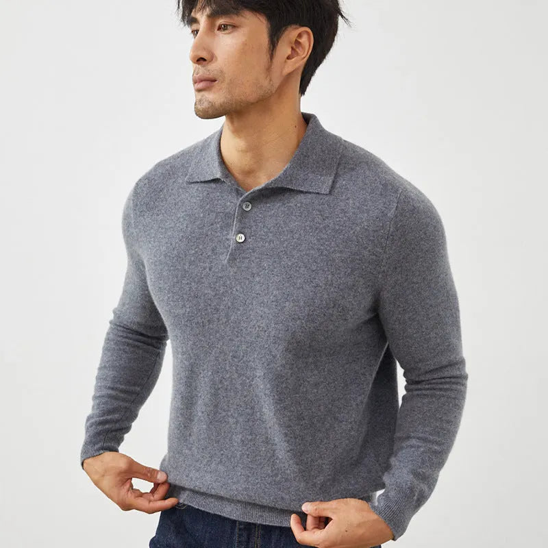 Man wearing a sapphire blue short sleeve cashmere pullover with a polo collar.
