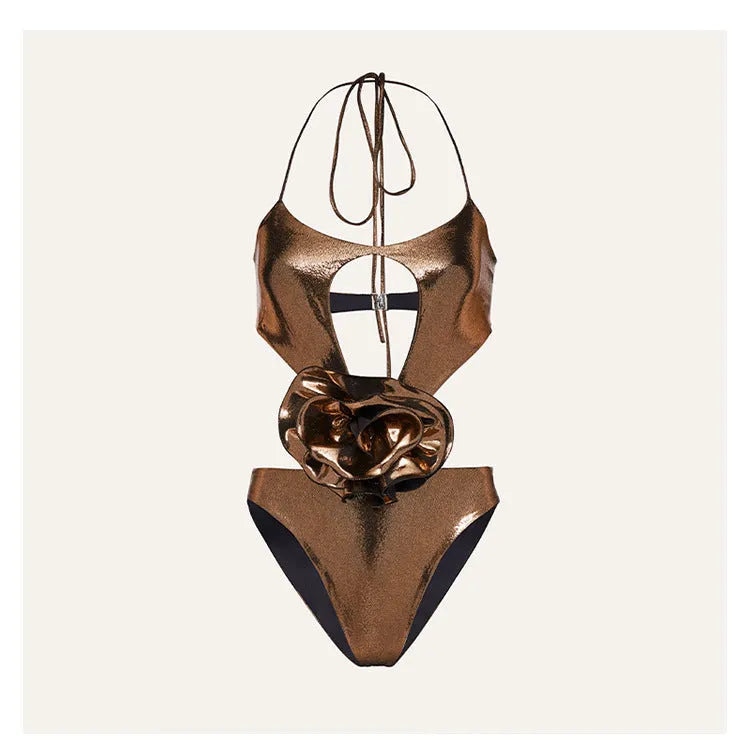 Gold handmade halter neck one-piece swimsuit with hollow-out detailing on a mannequin.