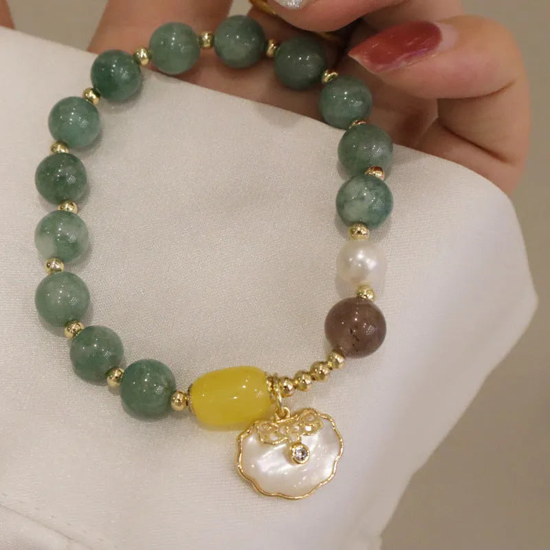 Women's green jade shell bracelet with adjustable fit in casual style