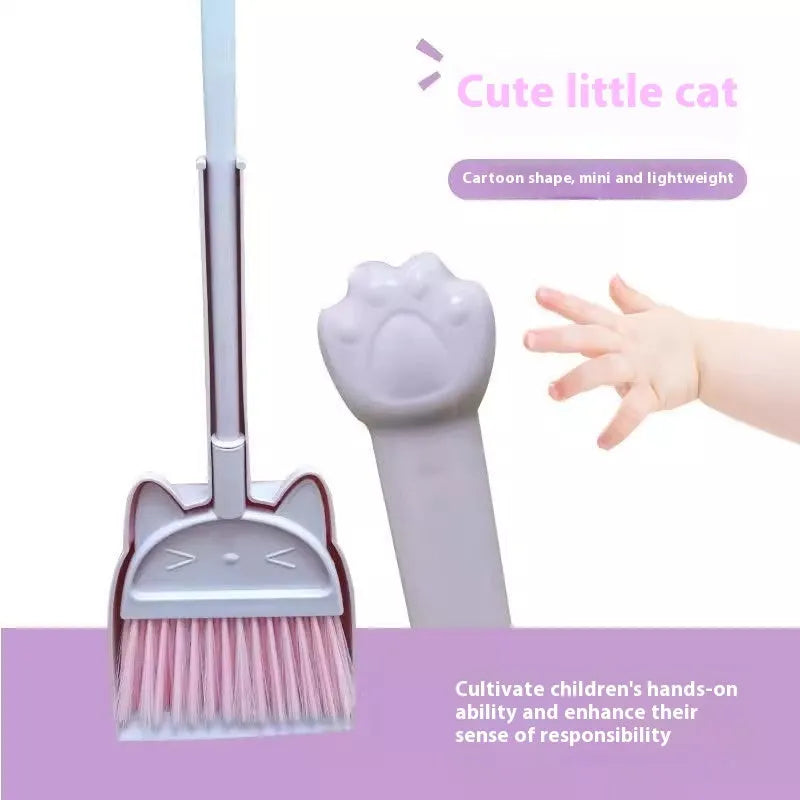 Purple plastic broom and dustpan set with a rotating brush holder on a wooden floor.