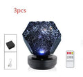 LED starry sky projector night lamp showing constellation projections on a bedroom ceiling with remote control
