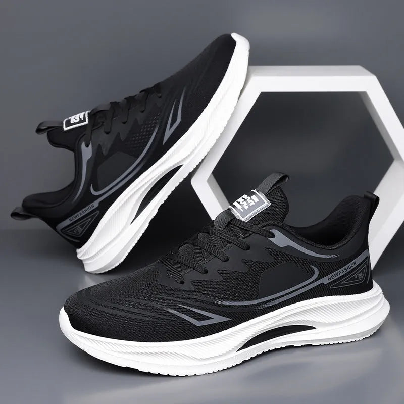 Men's solid colour casual shoe with a woven mesh upper and a low rubber sole.