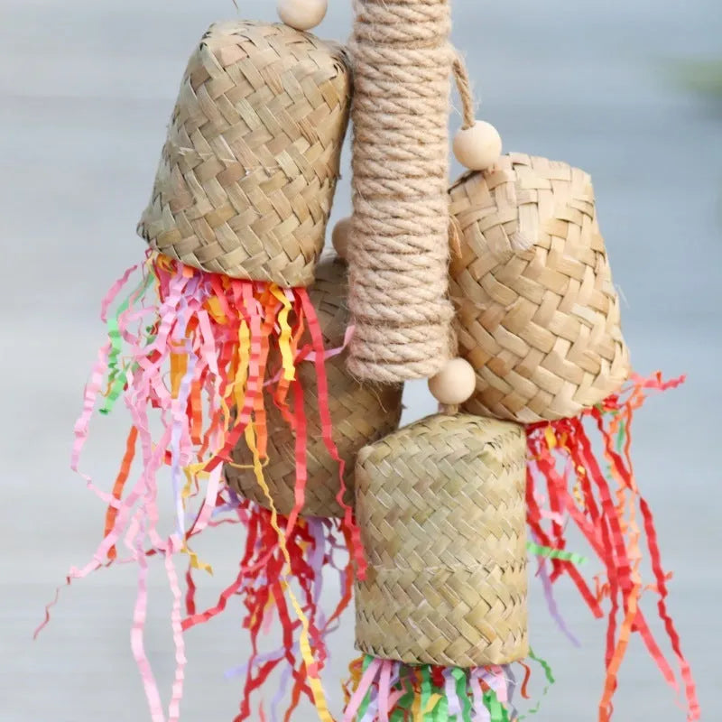 Parrot foraging toy made of wood and sisal rope with colourful shredded paper inserts