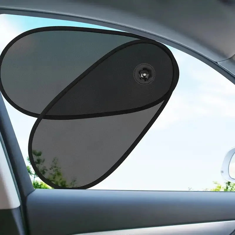 Black stretchy car side window sunshade fitted on glass with suction cups, shown twisted for storage.