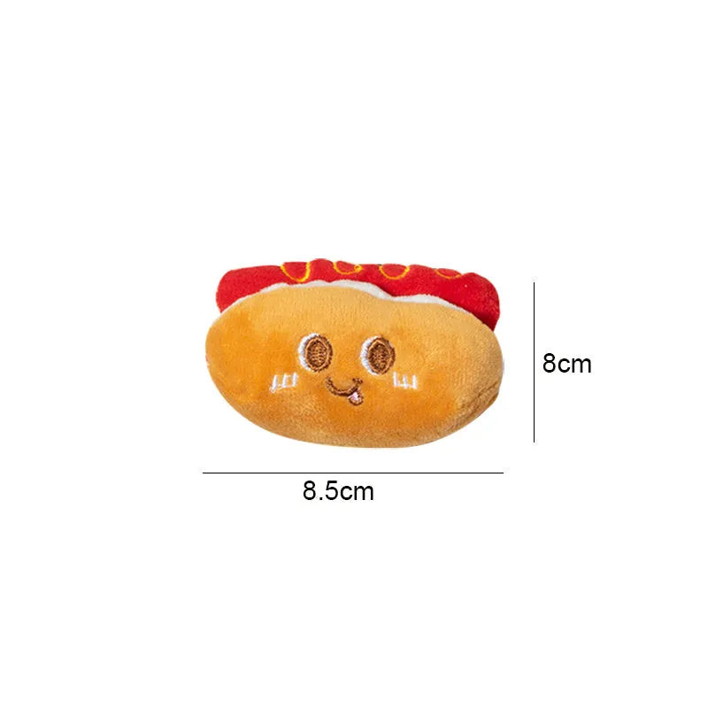 Cat chewing toy shaped like hamburger and chicken leg with catnip filling