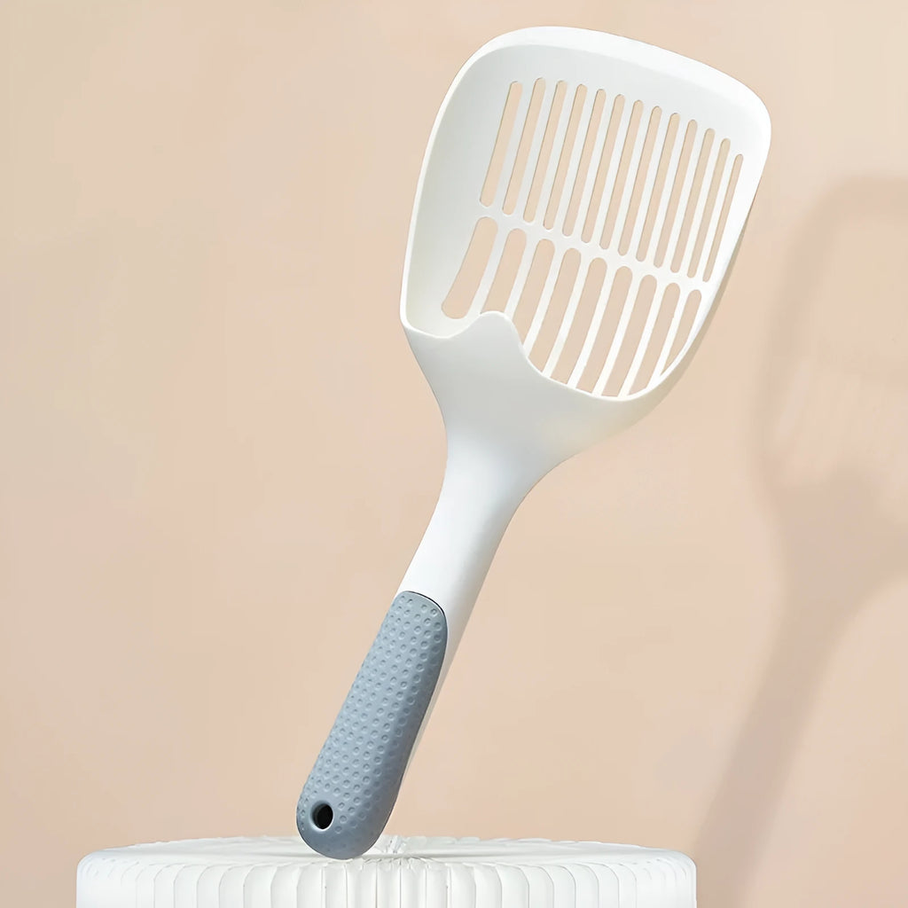 White plastic cat litter scoop with base, 29.5 x 12.8 cm, for cleaning cat litter trays