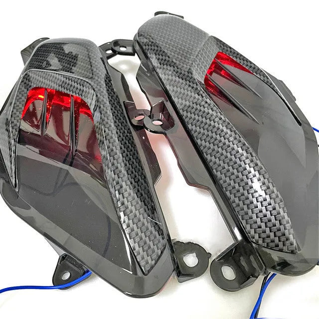 Pair of carbon fibre style side indicator lamps for Yamaha NMAX scooter.