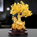 Citrine coloured resin money tree ornament with small water turtle model in Chinese style.