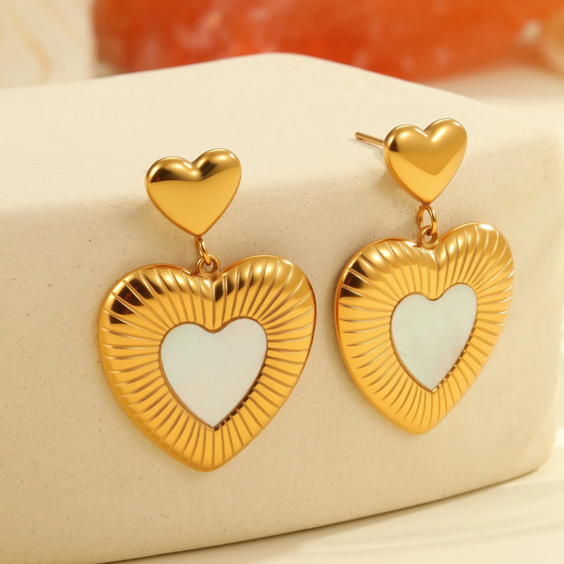 Gold electroplated heart-shaped stainless steel earrings with 18K finish for women