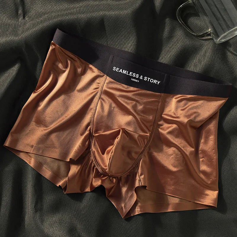 Men's ice silk underwear in multiple colours showing mid-waist design and smooth fabric texture