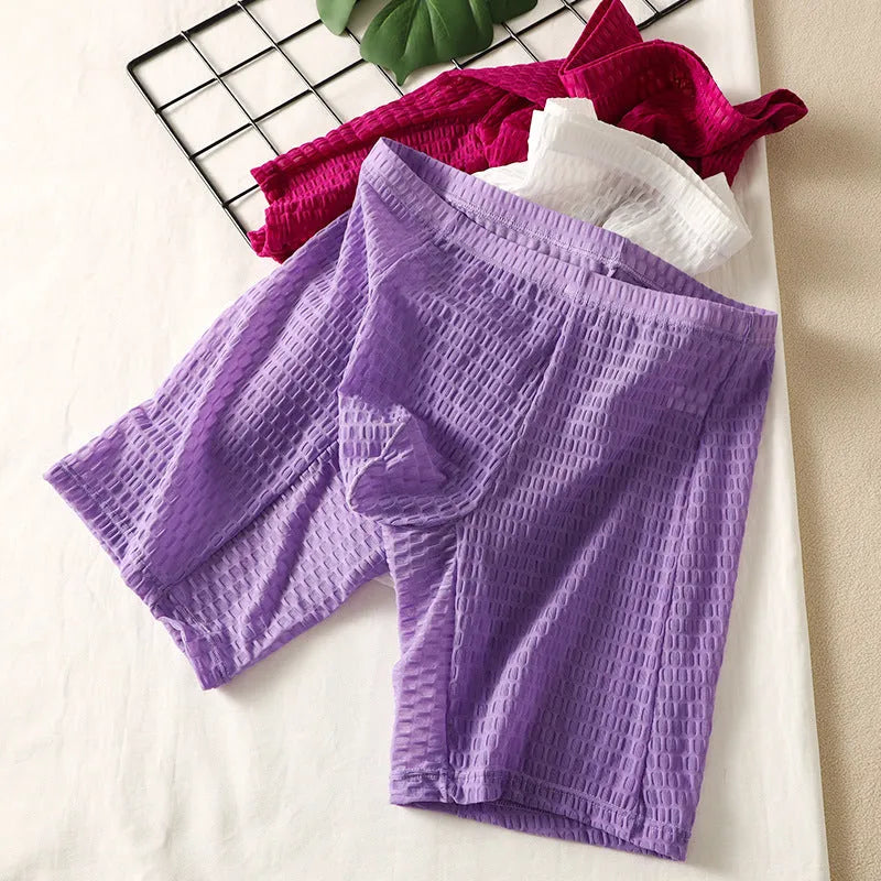 Men's solid colour lace boxer shorts with a hip lifting shaping design