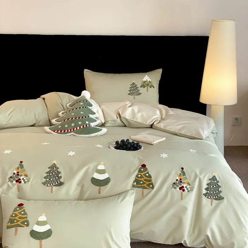 Cream Blue pure cotton duvet cover with raised white Christmas tree embroidery, paired with a fitted sheet and pillowcases.