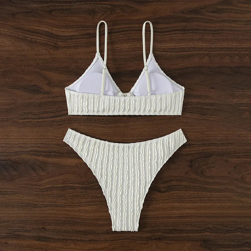 White women's V-neck sleeveless split swimsuit with top and shorts for swimming