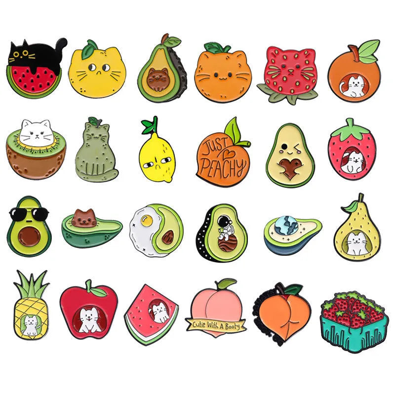 Colourful cartoon fruit design metal brooch with a silver pin fastener on the back.