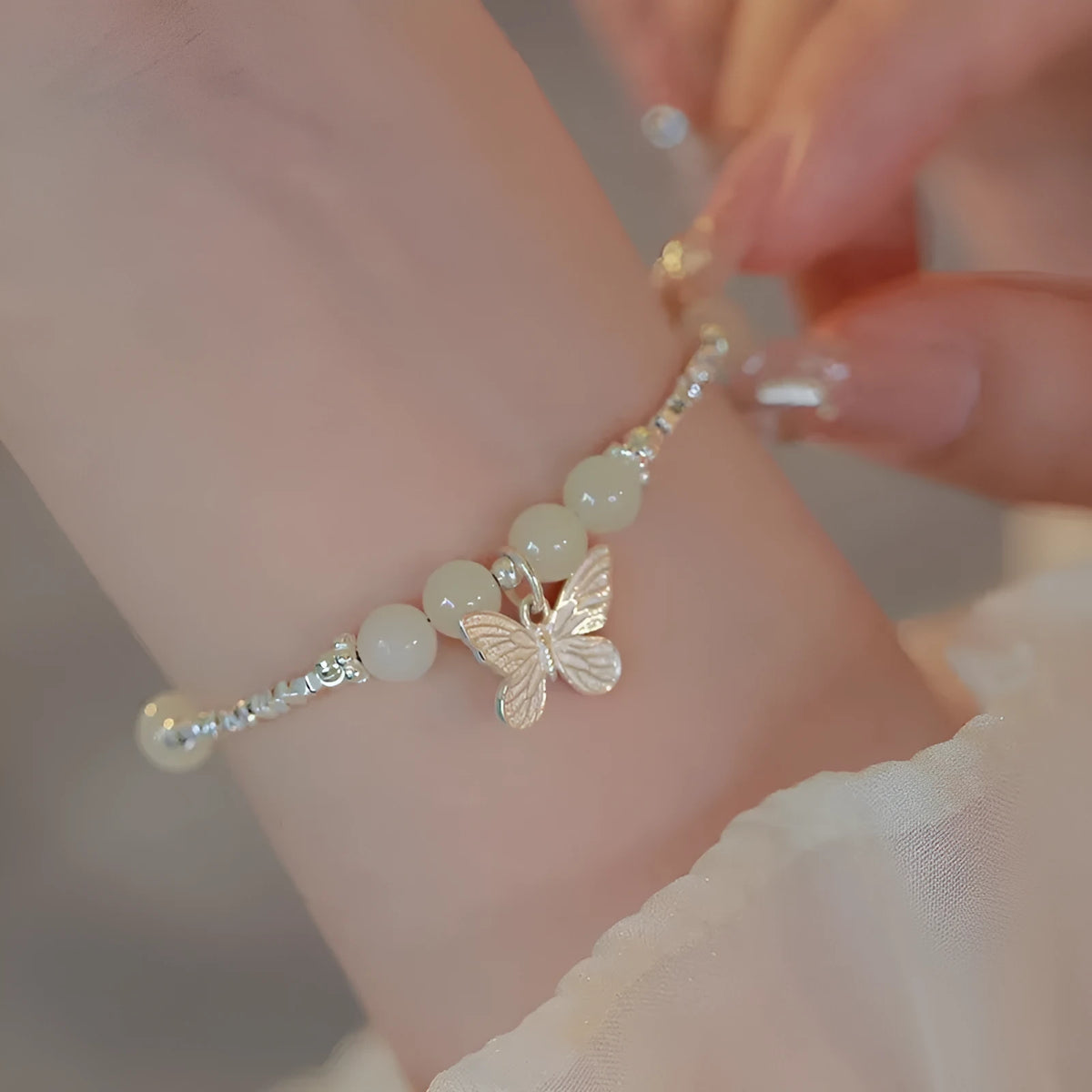 Hetian jade butterfly bracelet or necklace in electroplated copper, women's niche jewellery, silver tone