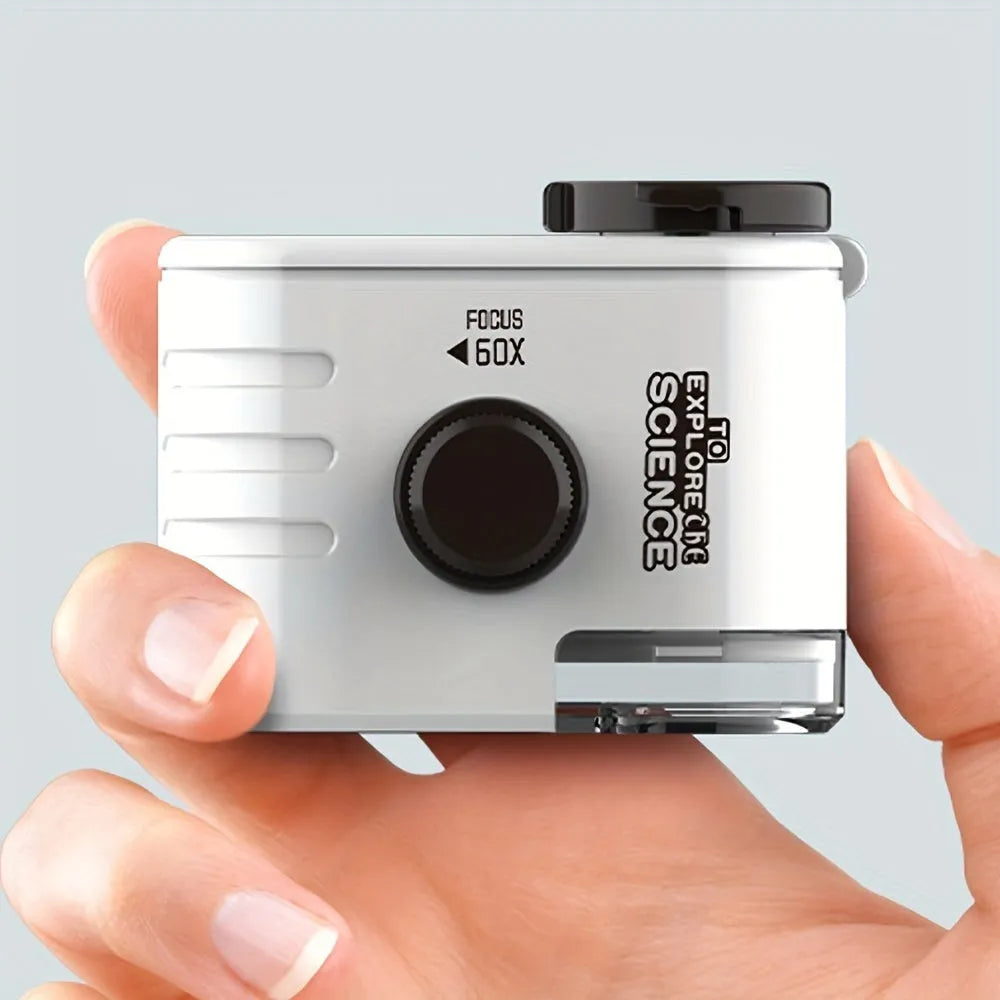 Mini 60x magnification mobile phone microscope with LED light and detachable phone clip on a white background.
