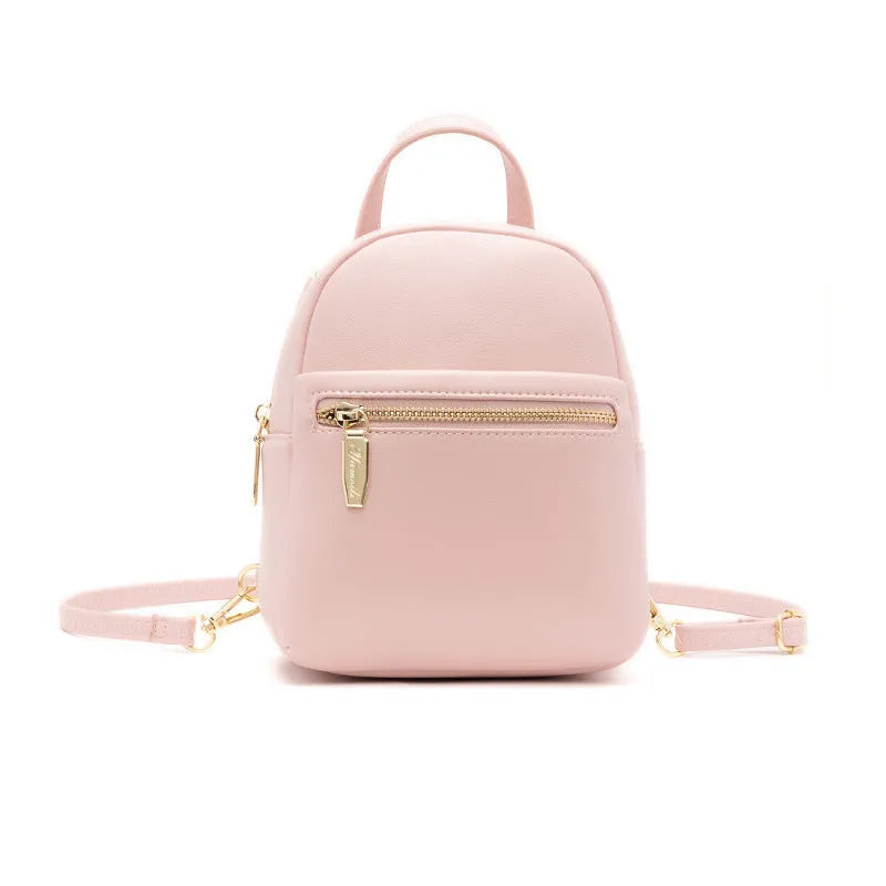 Soft PU mini backpack in street trend style with contrast colour detailing and external pocket.