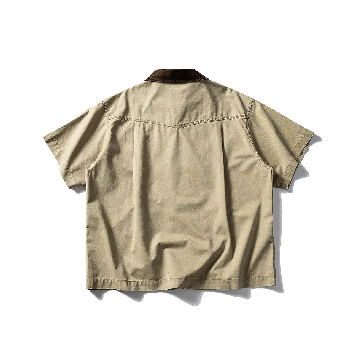Loose fit grey washed denim short sleeve shirt overalls on a hanger