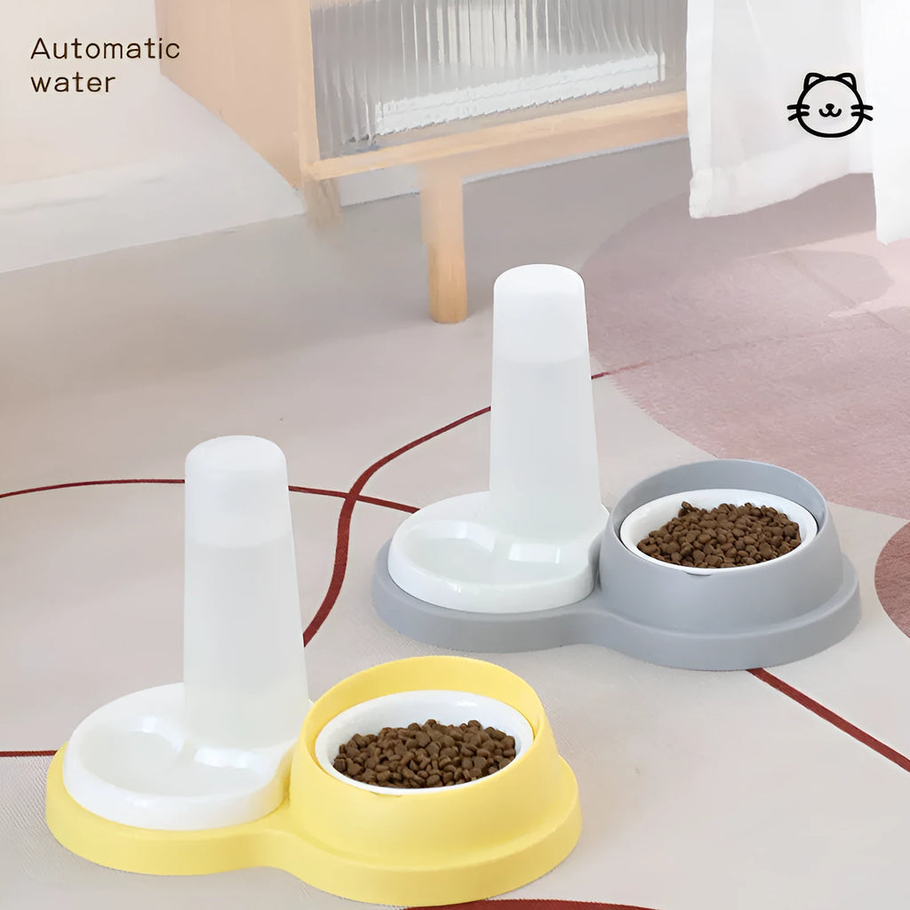 Grey and yellow dual-bowl pet feeder with raised neck collar and non-slip base
