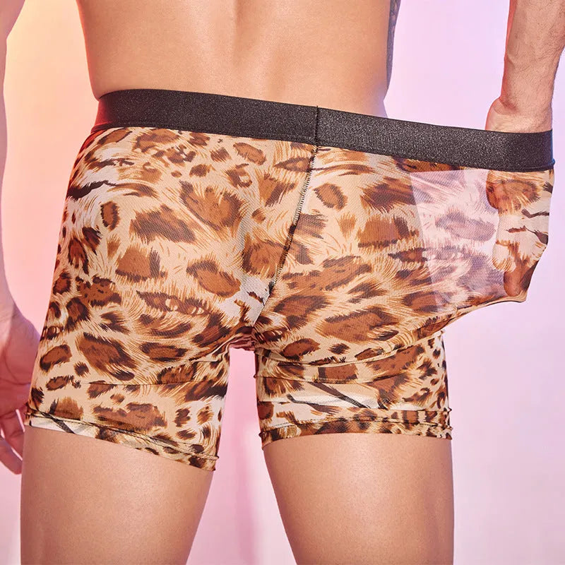 Men's leopard print nylon boxer shorts laid flat, showing the all-over animal pattern.