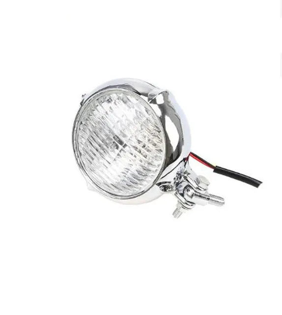 Black retro Harley-style halogen headlight for cars with yellow glass lens.