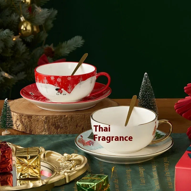 Ceramic tea set with gold-plated teapot and matching cup on dish, snowflake pattern, gift box