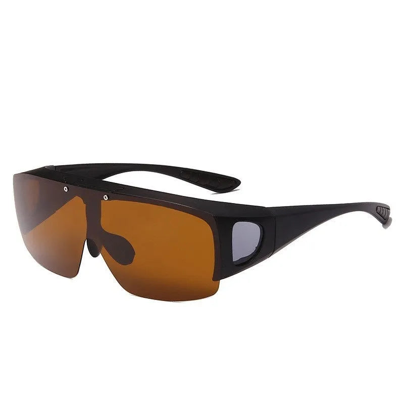 Polarised sports sunglasses with one-piece myopia correction lenses in a dark tint, suitable for cycling and climbing.