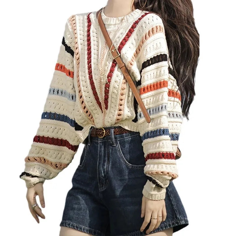 Retro rainbow striped loose sweater with batwing sleeves and a round neck.