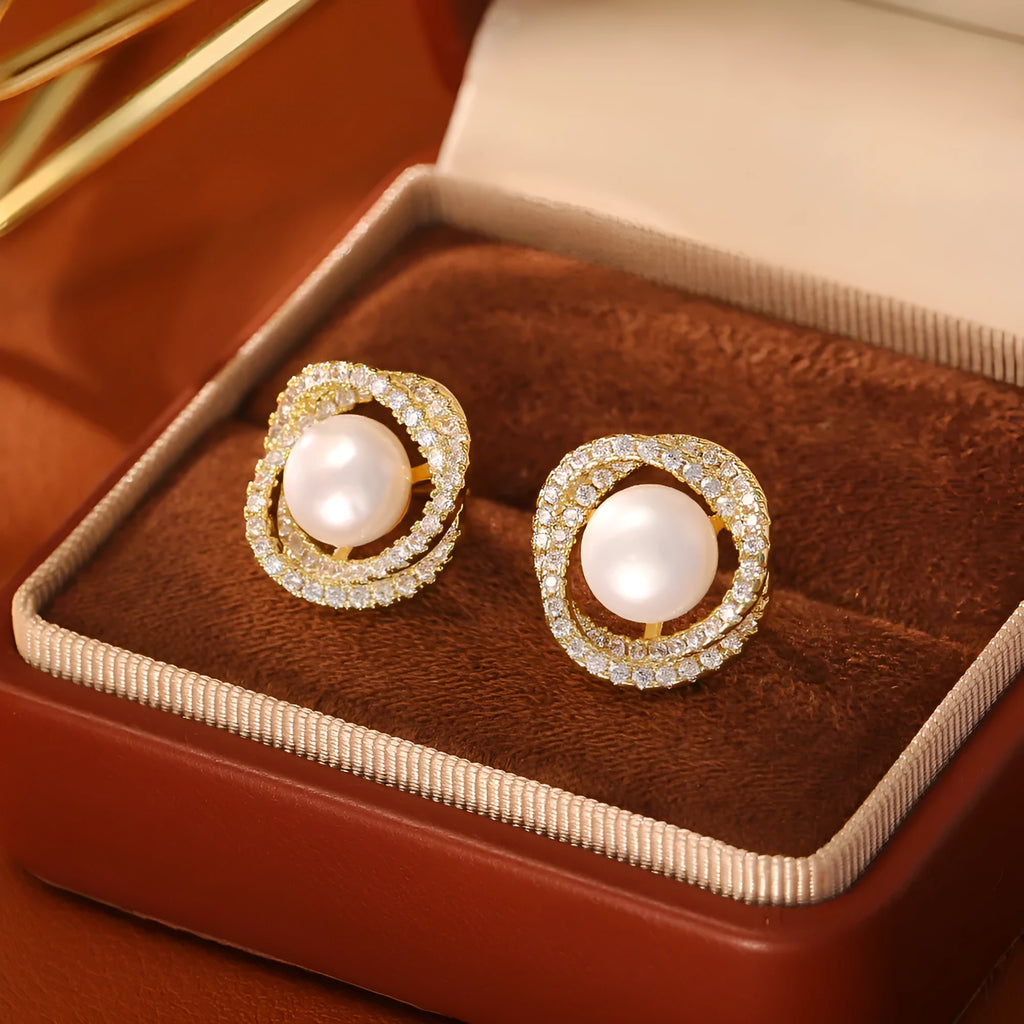 Natural pearl winding ear studs with real gold plating on copper base, geometric round shape