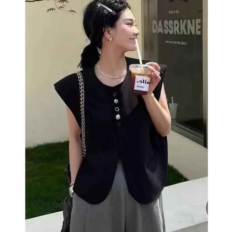 Women's loose fit vest with 40cm short length in milky white colour showing pocket detail