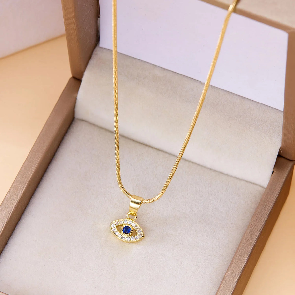 Devil's eye necklace with blue pendant, copper cross chain, 41-50cm perimeter, two colour options