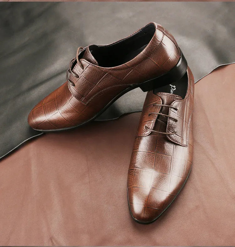 Men's black leather derby shoes with checkered pattern and pointed toe design on rubber soles