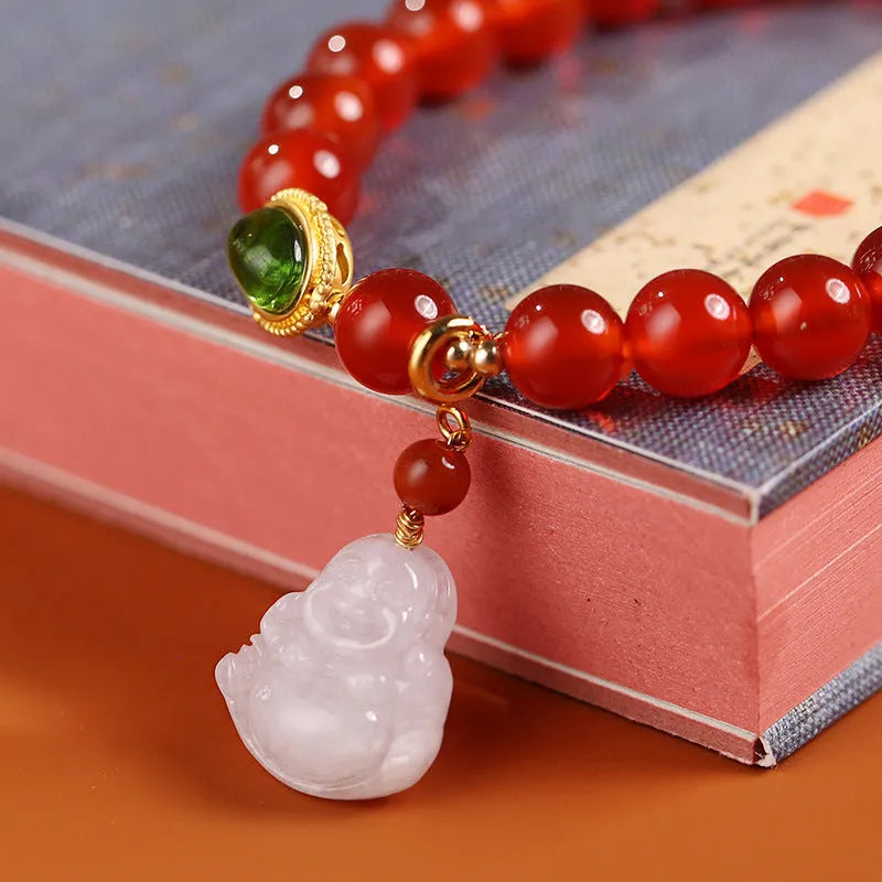 Red agate bracelet with amber geometric component and Maitreya Buddha pendant featuring ancient gold hanging jade accents
