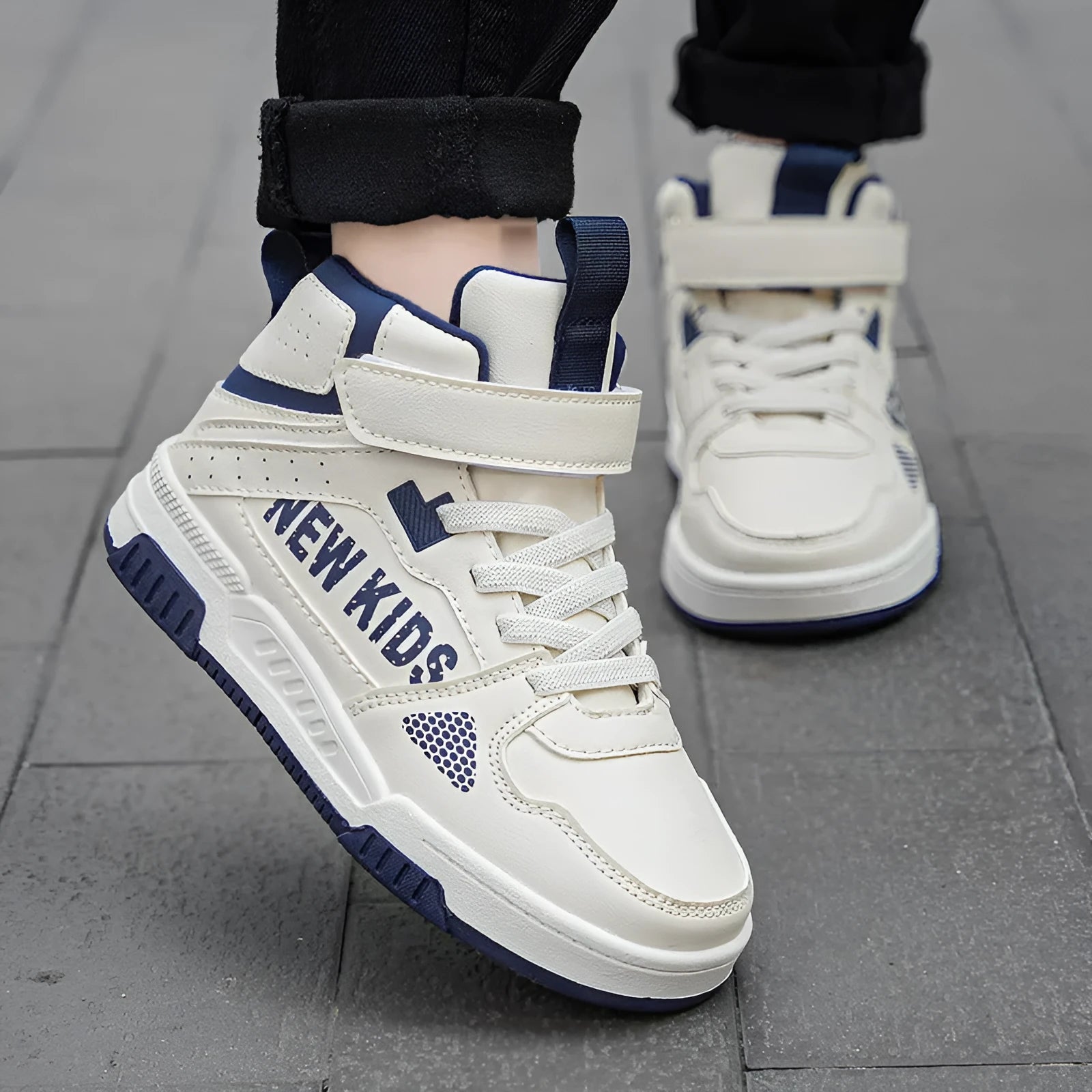 Children's street sneakers in multiple colours with PU upper and rubber sole showing lace-up buckle fastening