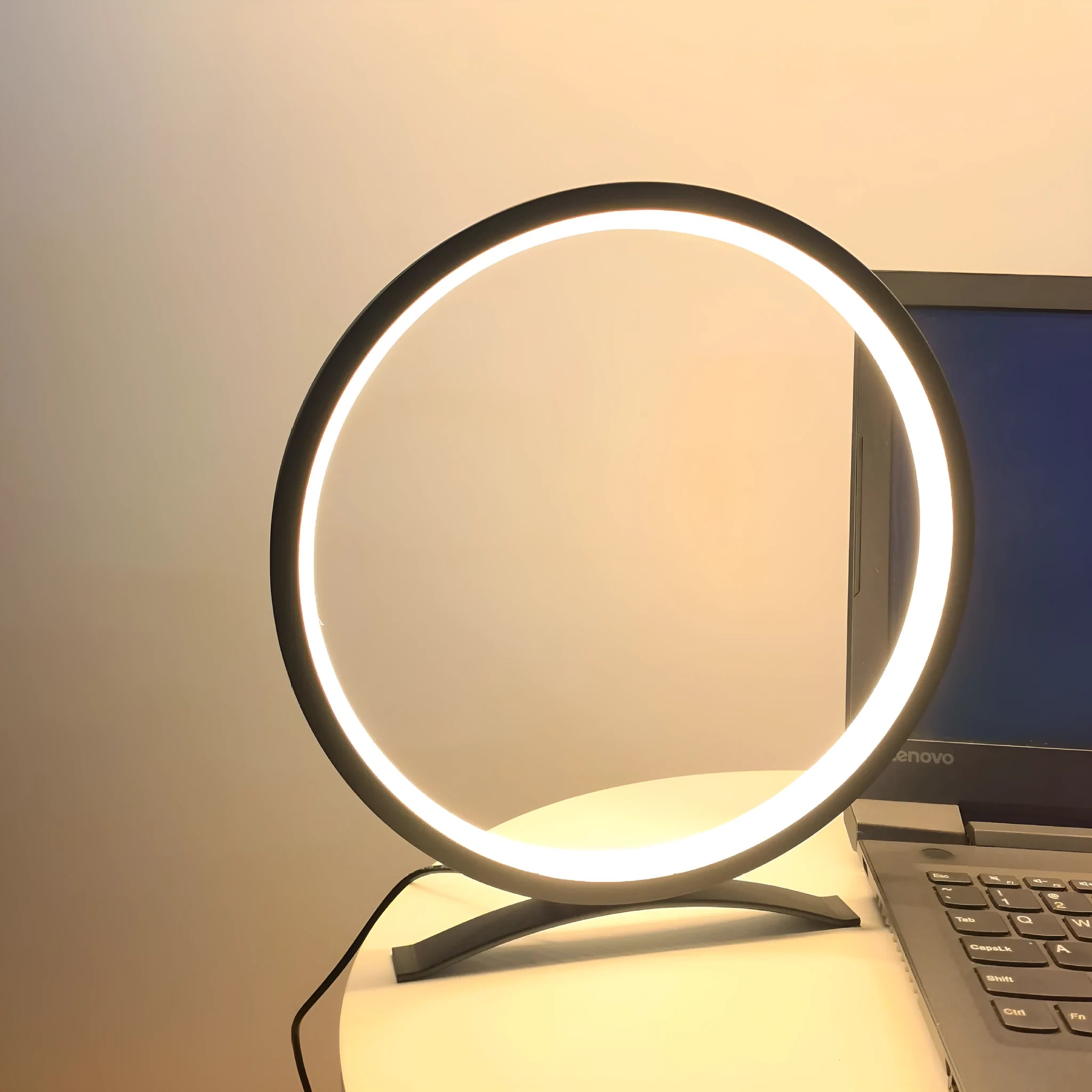 Modern minimalist desk lamp with metal stand, USB cable, and compact 25cm base in black warm light finish