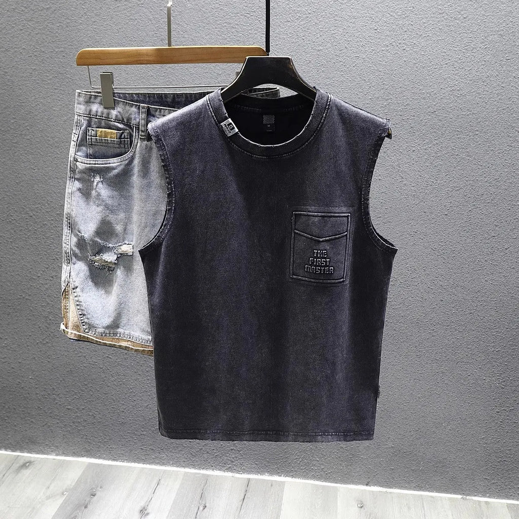 A solid colour loose-fitting cotton sleeveless T-shirt with a straight hem, shown in white.