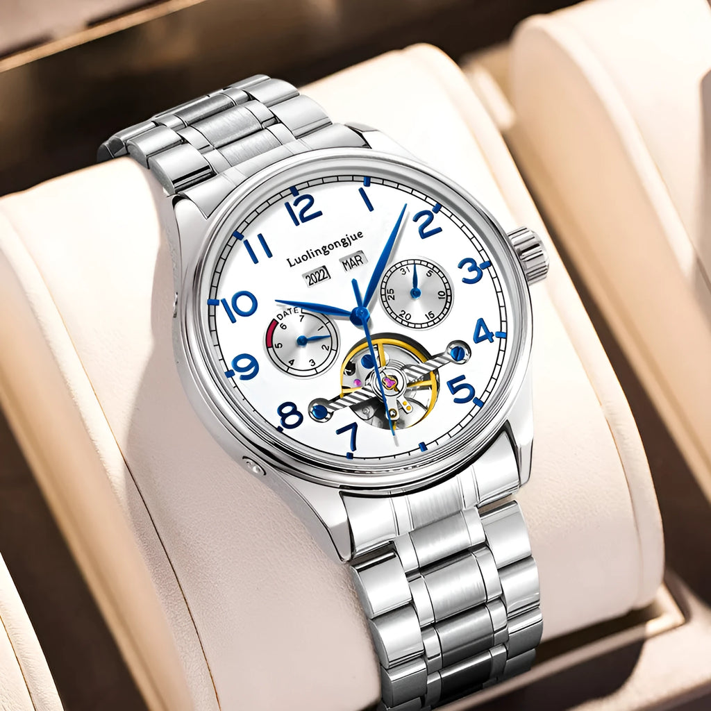 Men's stainless steel mechanical watch with sapphire glass on a leather strap.