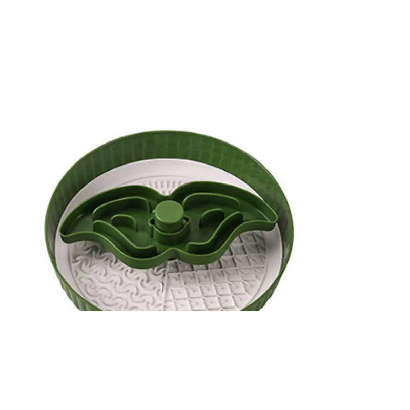 Colourful rotating pet slow feeder bowl with a silicone licking mat in a windmill design.