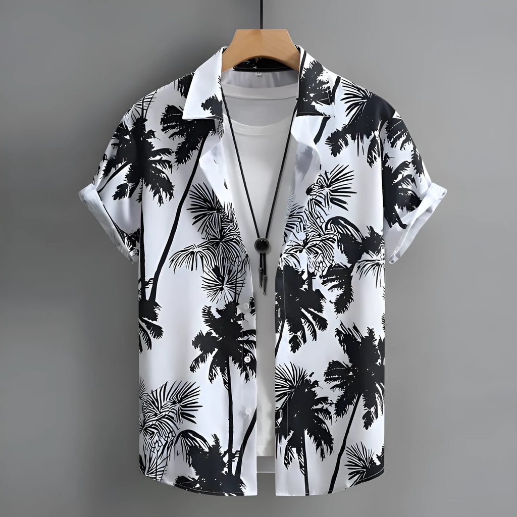Man wearing a short-sleeved Hawaiian shirt with colourful 3D printed patterns.