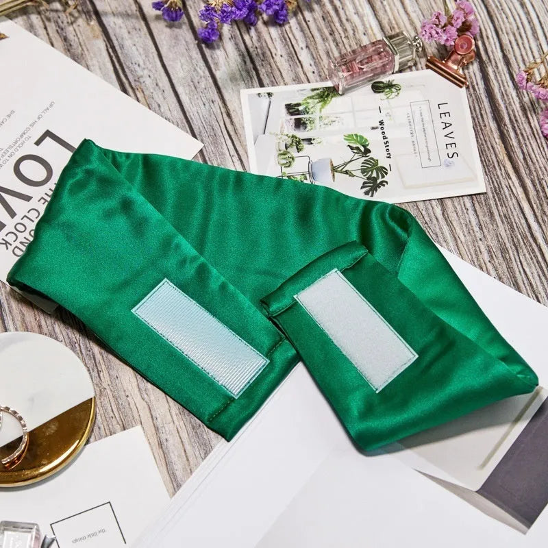 Mulberry silk sleep eye mask shown in one of seven colours: black, gold, blue, gray, white, pink, or green.