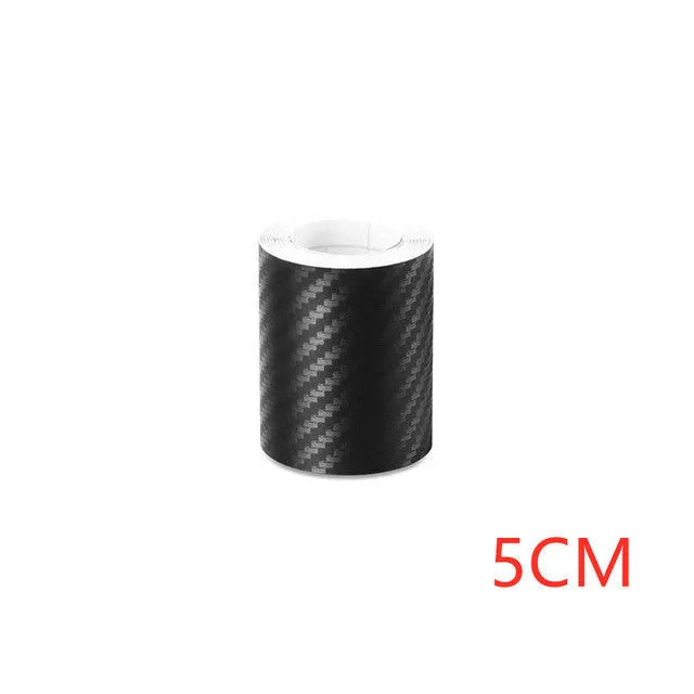 Matte carbon fibre pattern vinyl roll for car door sill protection, showing textured surface and roll format.