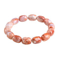 Natural cherry agate bracelet with 10x14mm barrel beads in geometric design