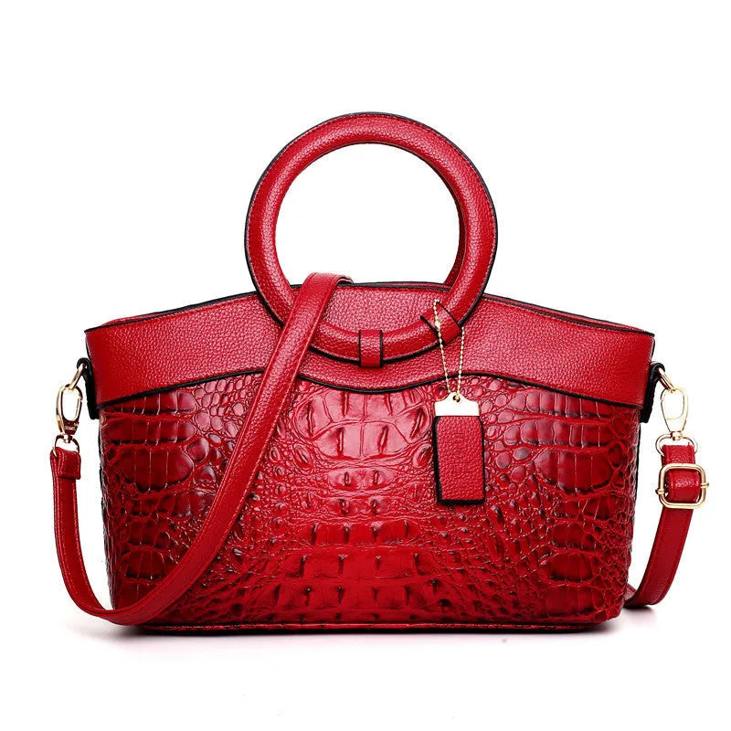 A casual fabric shoulder bag for women in multiple colours, showing zipper pockets and a handle.