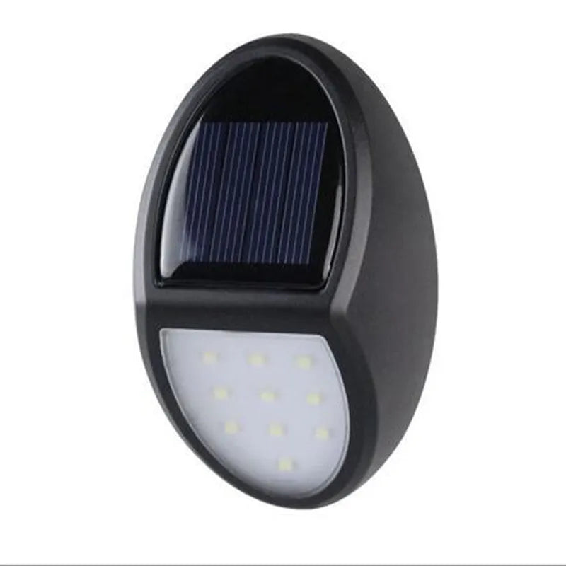 Black rectangular solar wall light with solar panel and LED illumination for outdoor use