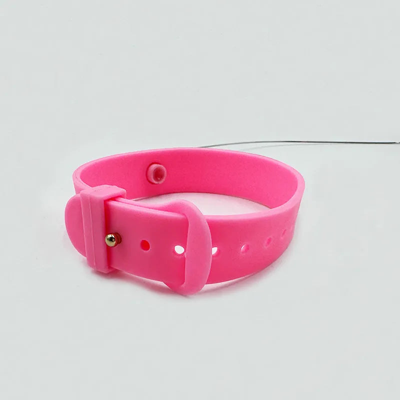 Pink and blue adjustable collar cat teaser toy with feather and bell attachment on a white background