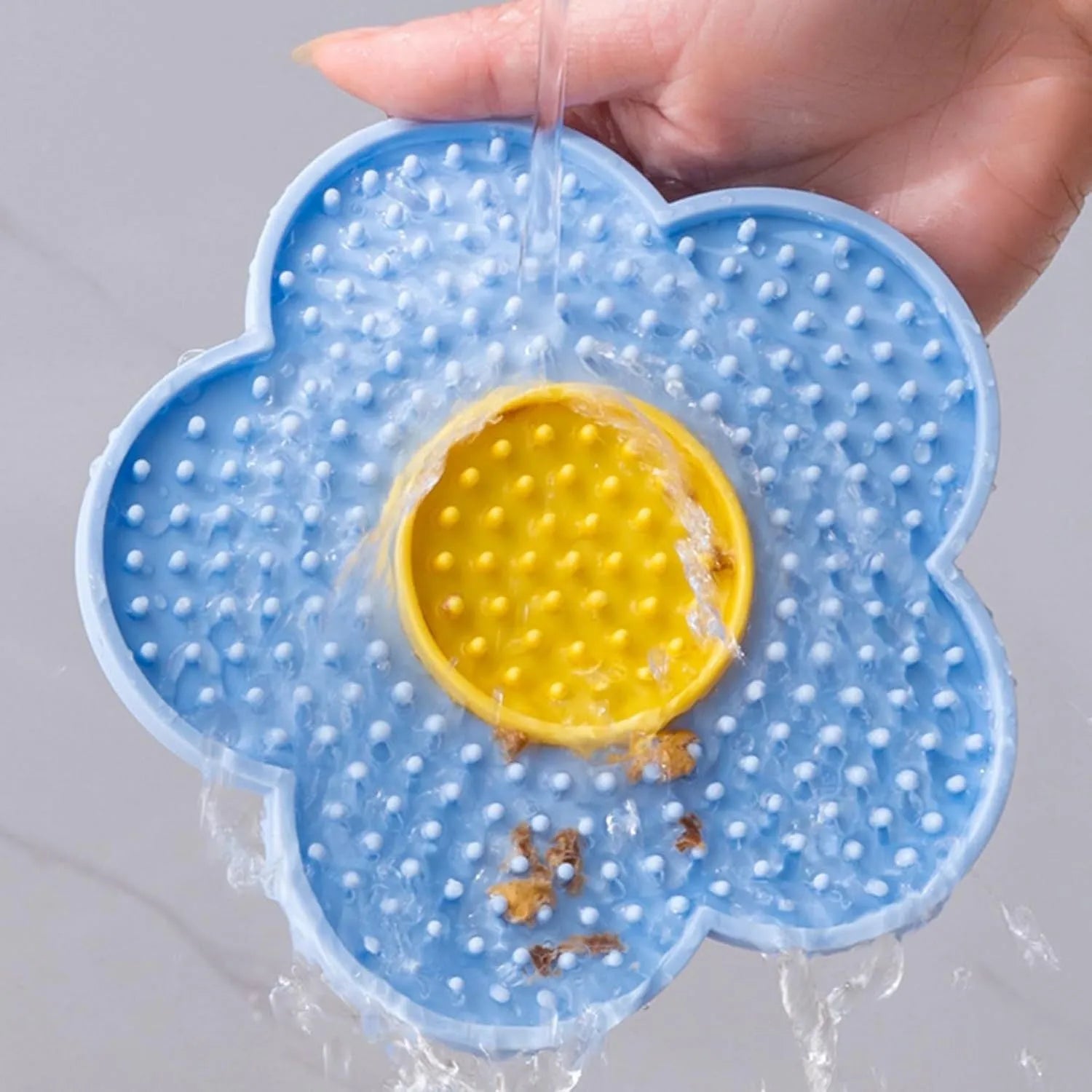 Grey flower-shaped silicone pet lick mat with suction cups for slow feeding