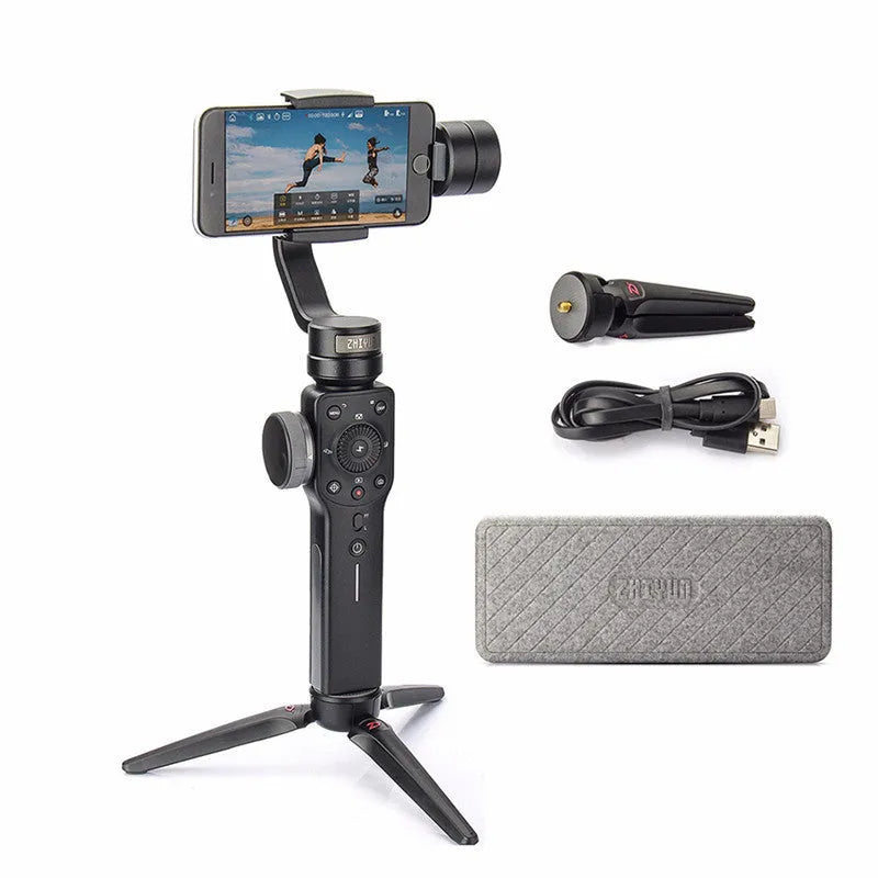 Black handheld smartphone gimbal stabilizer on a table