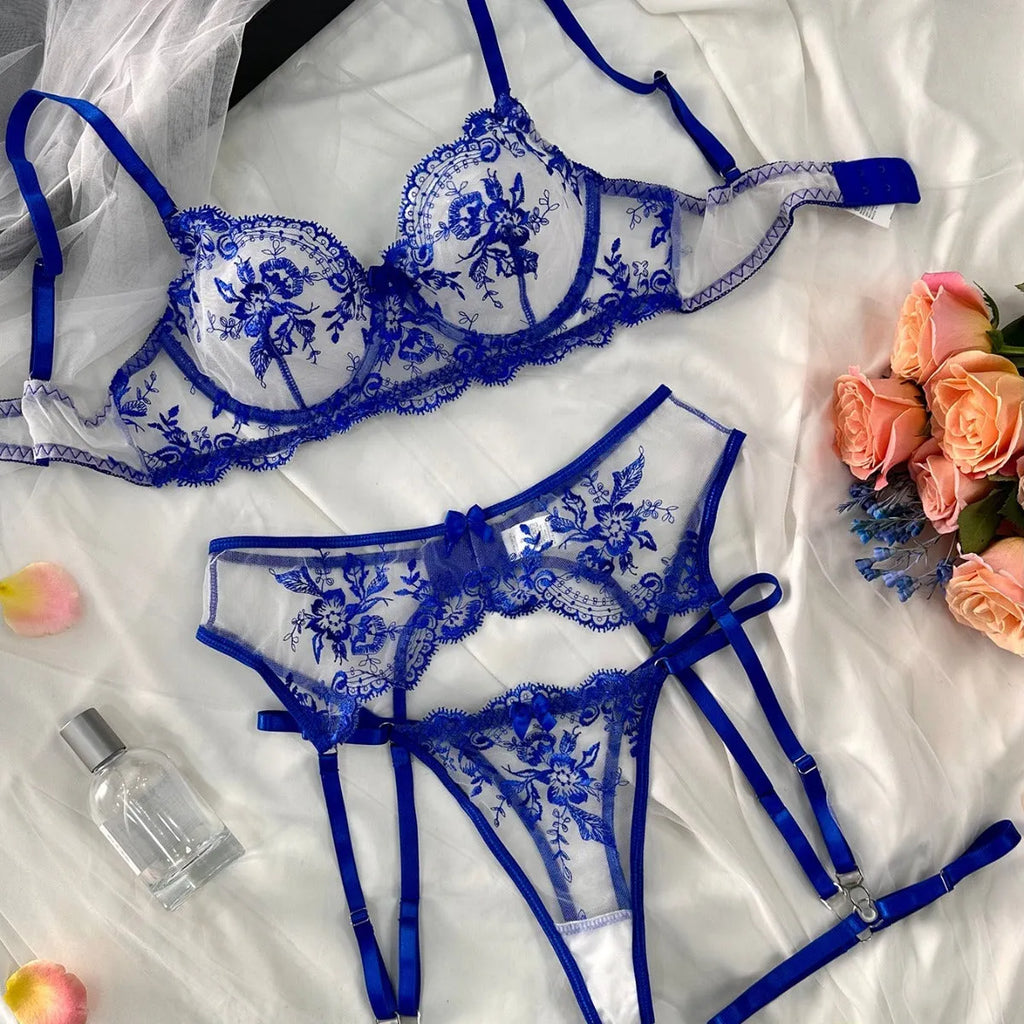 Sapphire blue women's see-through embroidered underwear set with cutouts, includes top, pants, and garters.