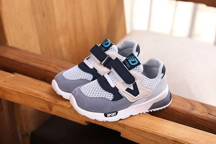 Girls summer mesh running shoes with TPR sole, grey colour, side view showing V-shaped design and breathable upper